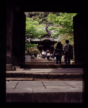 Lovers couple  just entering the main gate of the Shuzenji temple
